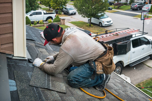 Professional Roofing technician working in La Fontaine, IN